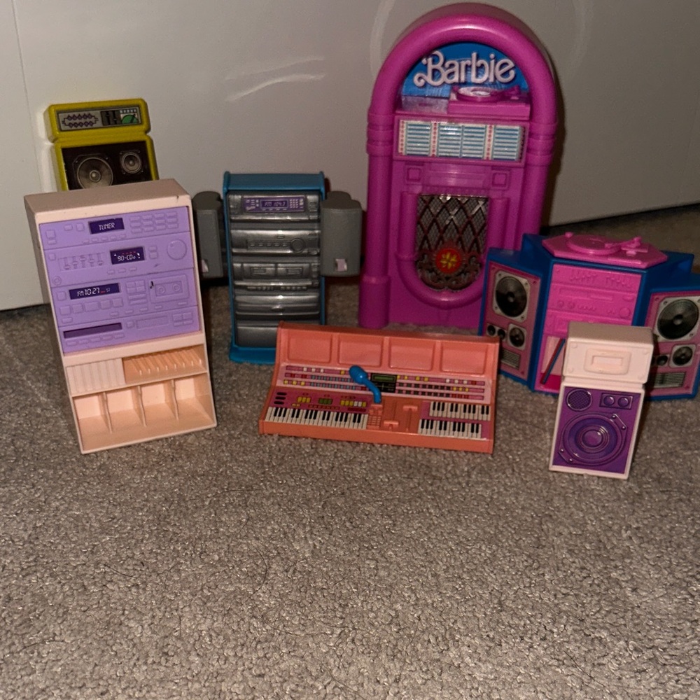 Vintage Barbie Doll Jukebox and other music items.
